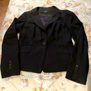 Laddies dress black jacket fitted with front pockets